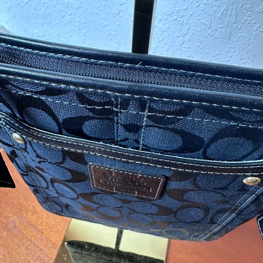 Coach Black Signature Crossbody Bag with brass hardware